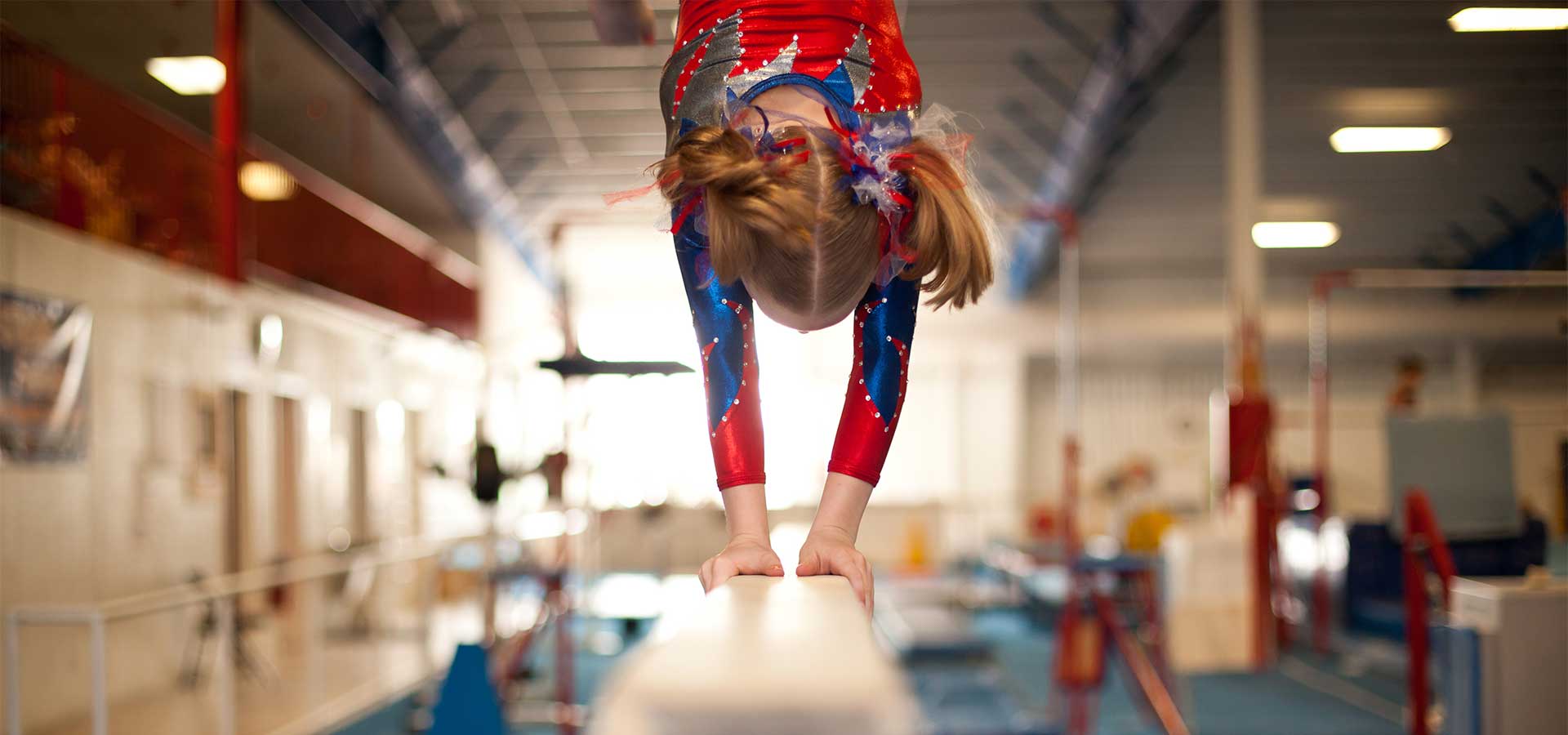 young gymnast doing handstand